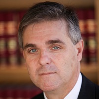 The Hon. Justice Adam Hatcher